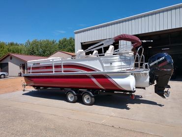 Red and White Boat Park on the Garage