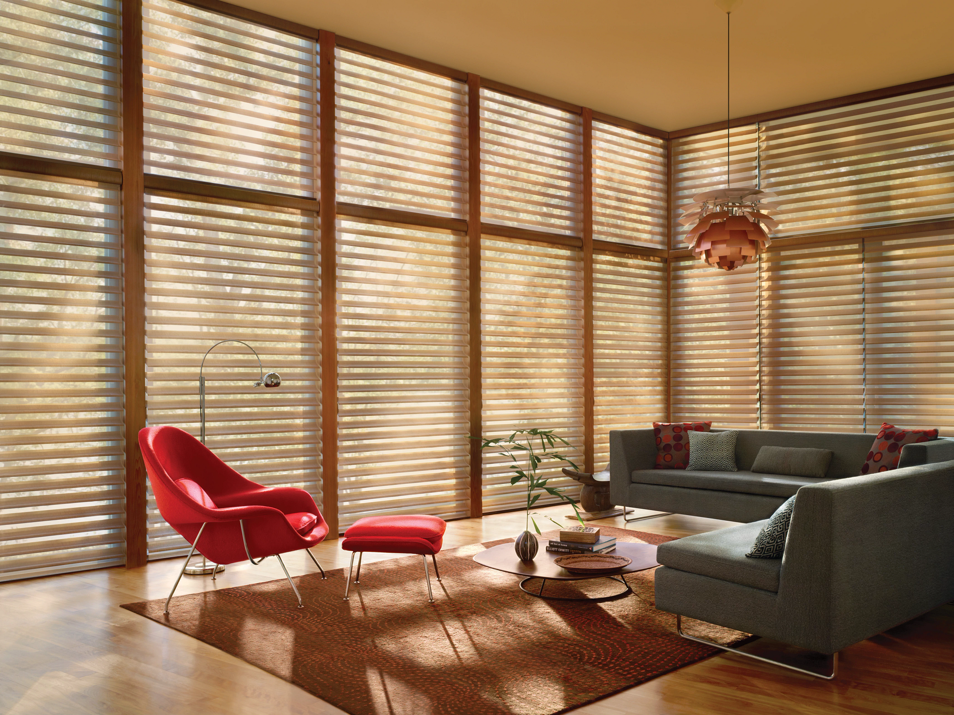 Hunter Douglas Silhouette® Sheer Shades covering windows in a contemporary living room. 