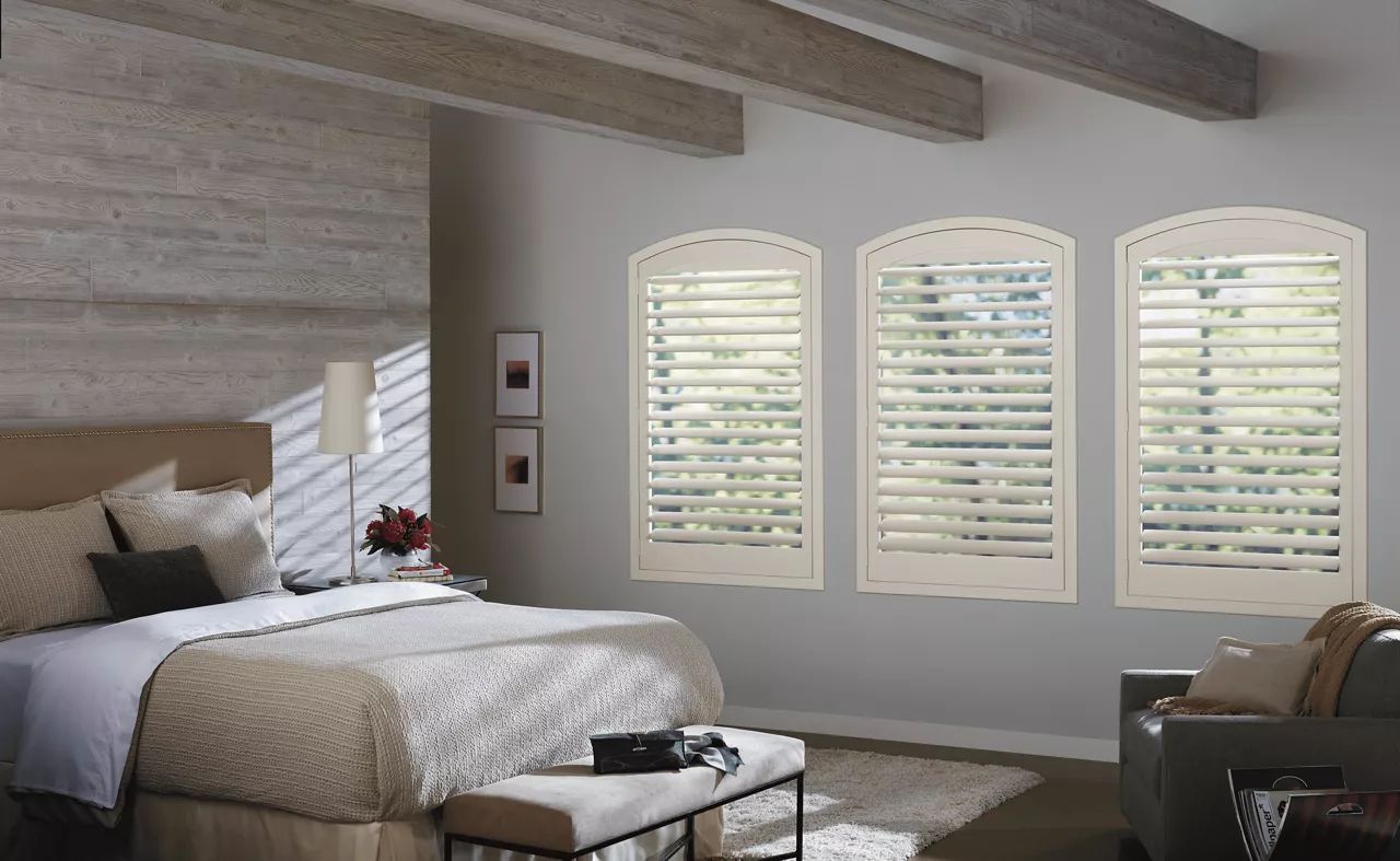 Composite shutters in a modern bedroom near Fletcher, NC.