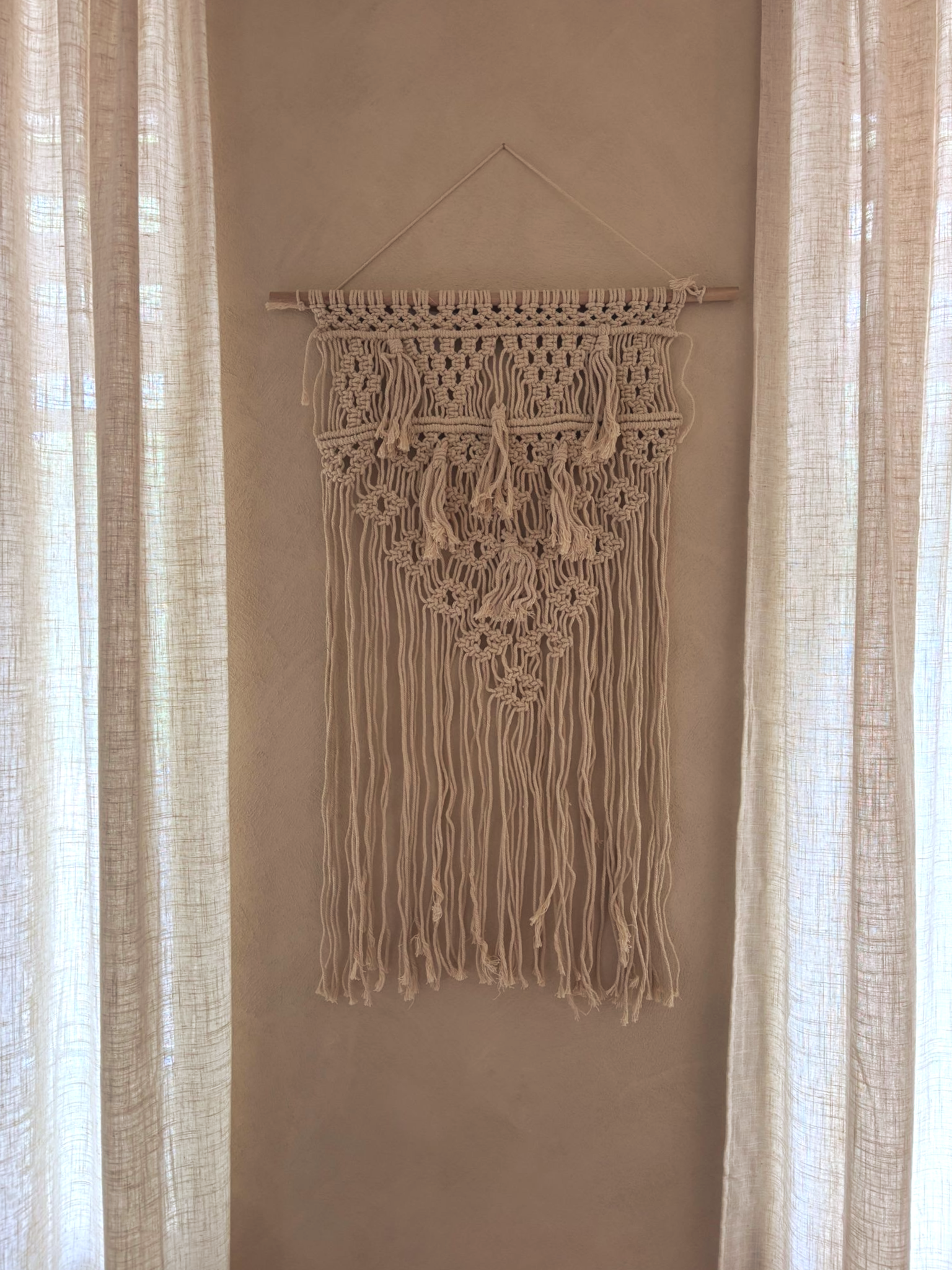 Macramé wanddecoratie