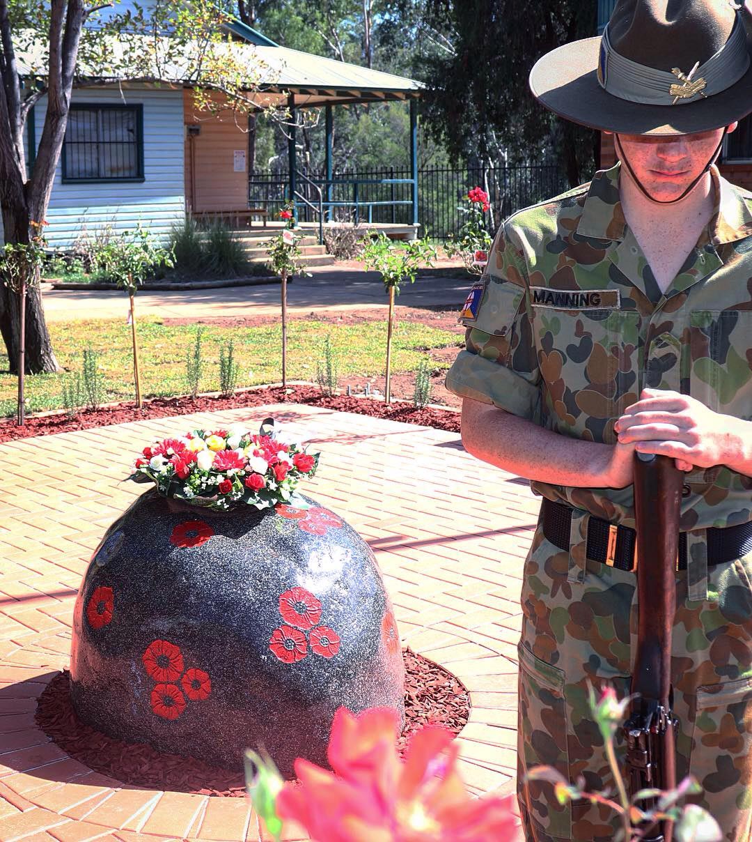 soldier guarding stone