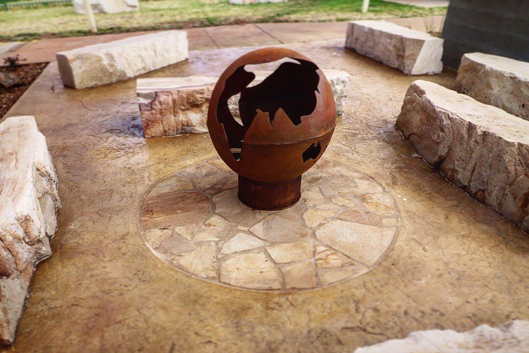 rusted figure display