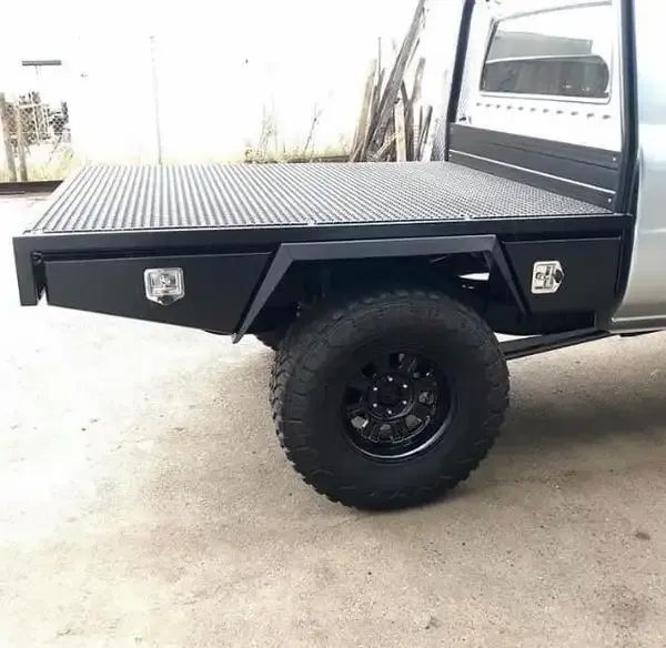 A Silver Truck With A Black Bed Is Parked On The Side Of The Road — Hunter Powder & Paints In Muswellbrook, NSW