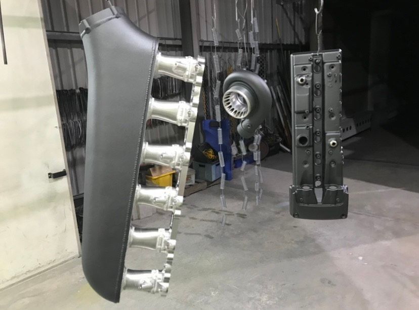 Powder Coated Car Parts Hanging — Hunter Powder & Paints In Rutherford, NSW