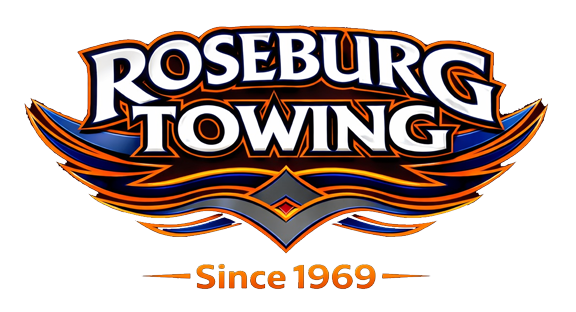 Roseburg Towing logo with text in a stylized font and a gray swoosh.