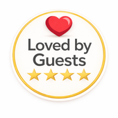 “Loved by Guests” badge with red heart and four gold stars on white background
