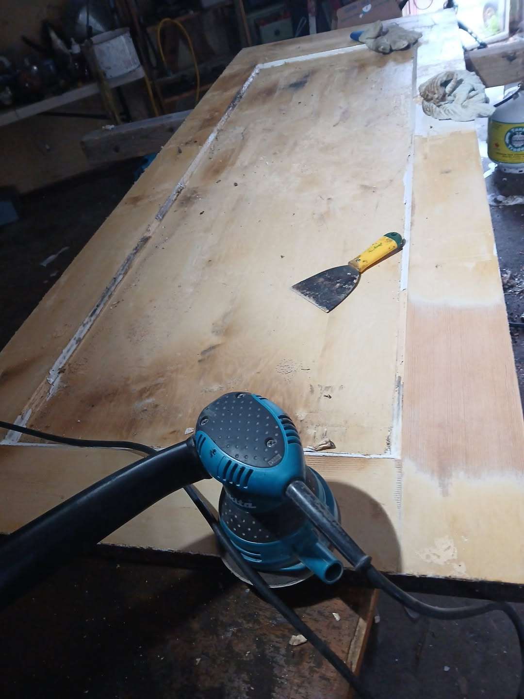 freshly sanded antique entry door