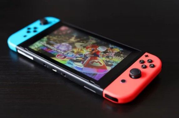 Diverse group of people with hands in a circle, teamwork concept.