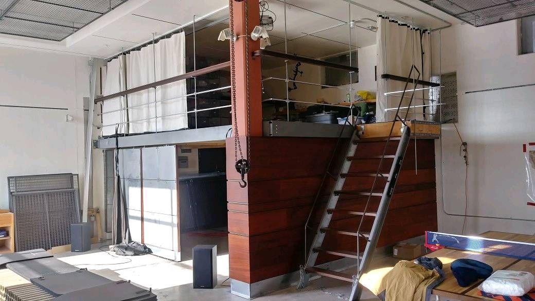 There is a ladder in the middle of the room.