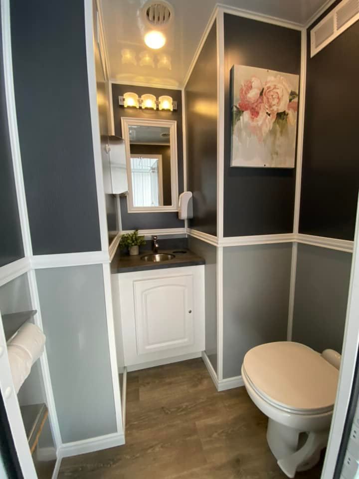 mobile restroom with open doors and steps. mobile restroom with open doors and steps.