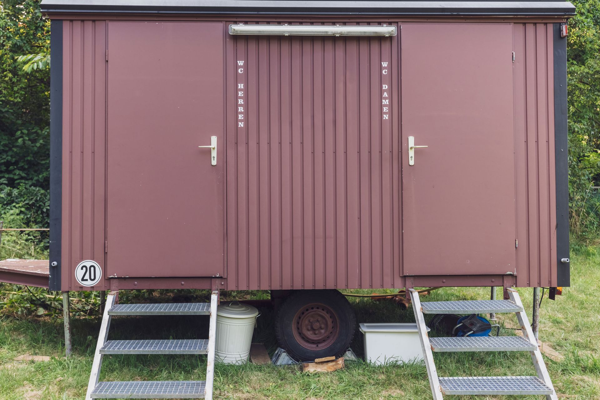 Red portable toilet trailer. Red portable toilet trailer.