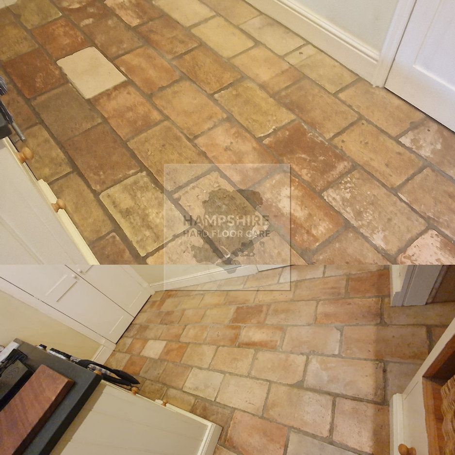 Terracotta tiles undergoing machine agitation to lift embedded dirt