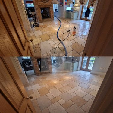 Limestone tiles being cleaned with pH-neutral solution during restoration process