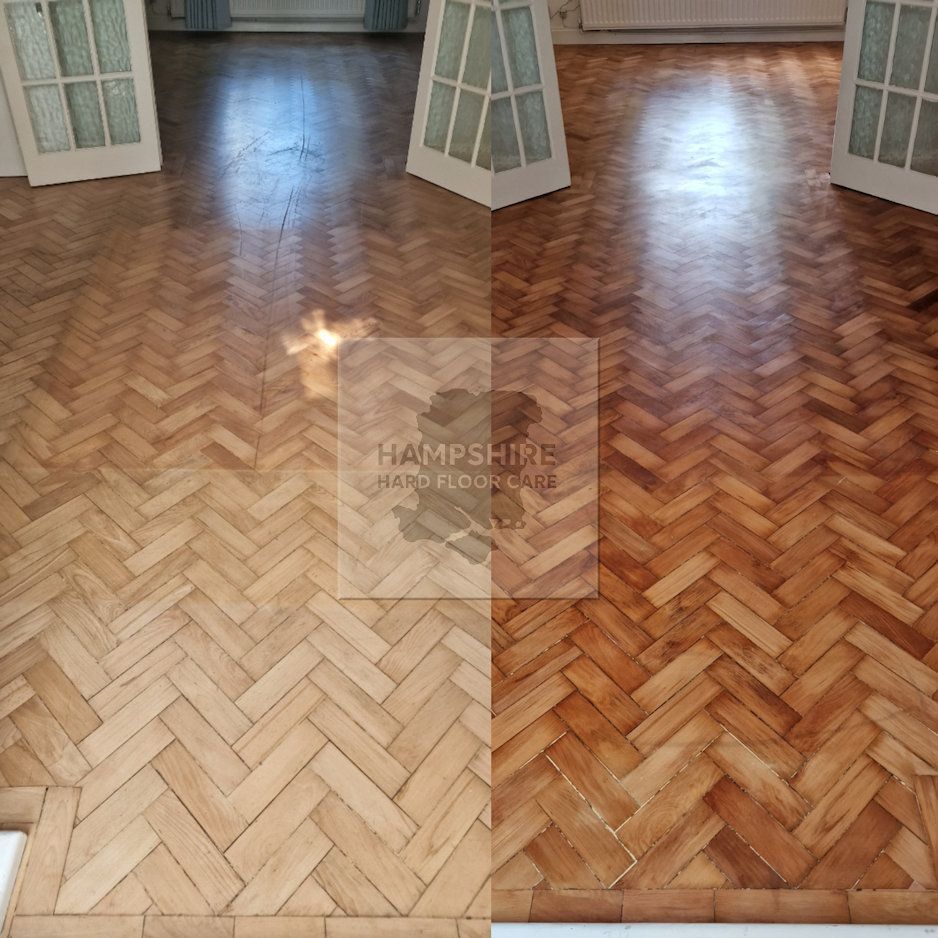 Applying protective oil to wood floor after sanding for long-lasting durability