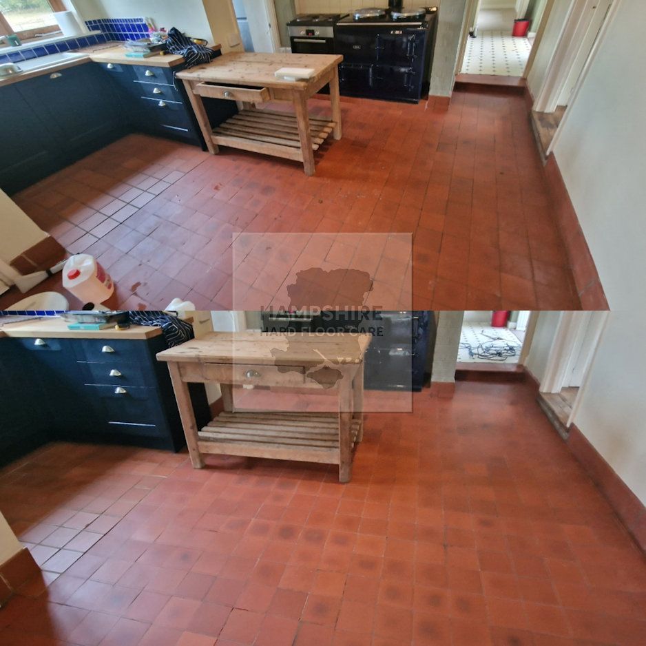 Machine agitation lifting compacted dirt from porous quarry tile surface