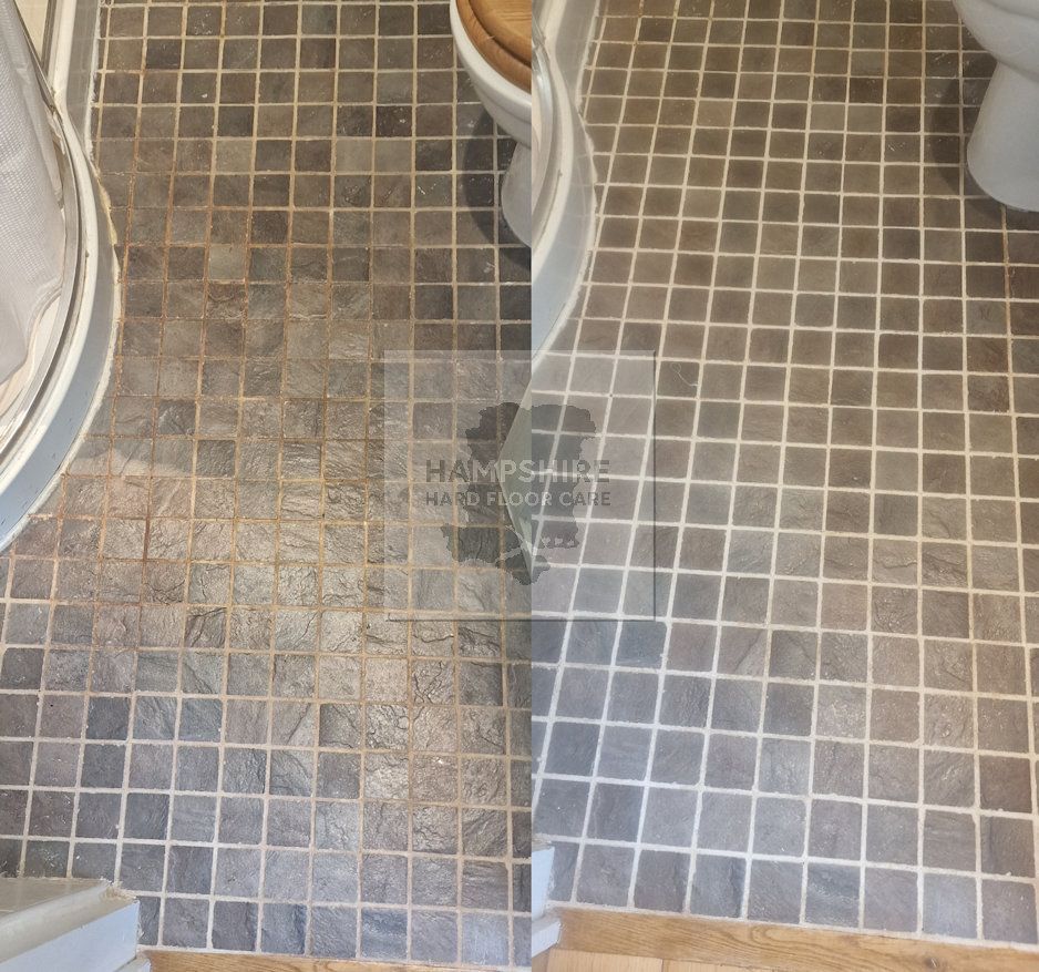 Slate floor before deep cleaning showing trapped dirt and uneven surface tone