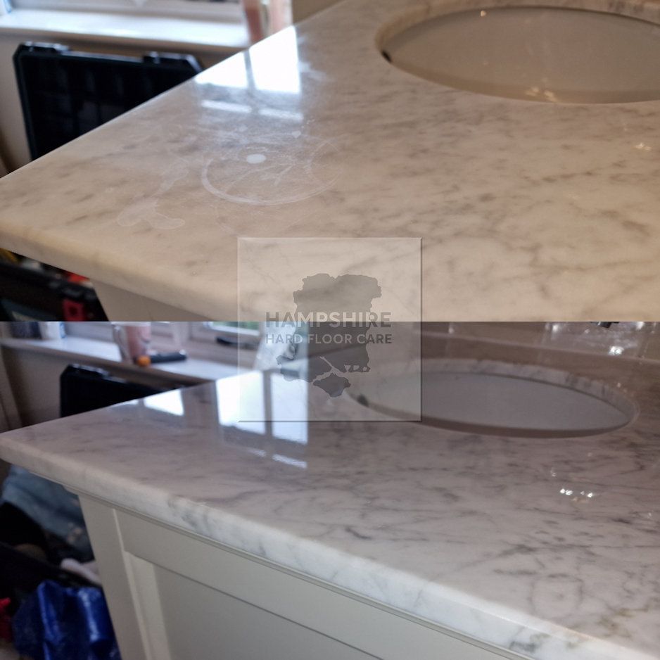Marble countertop undergoing polishing to repair surface etching
