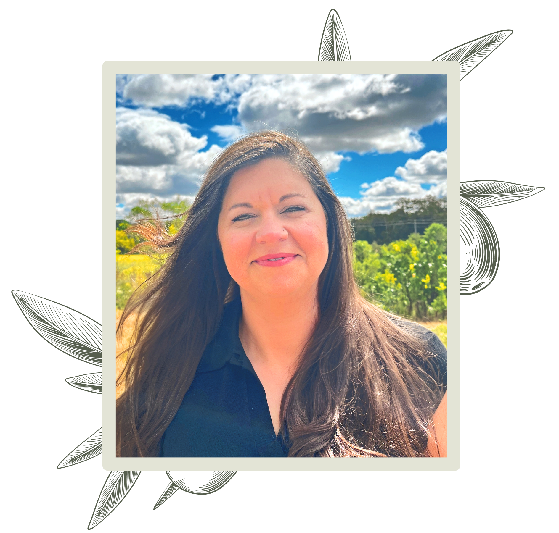 Woman with long dark hair smiles outdoors, framed by stylized olive branch.