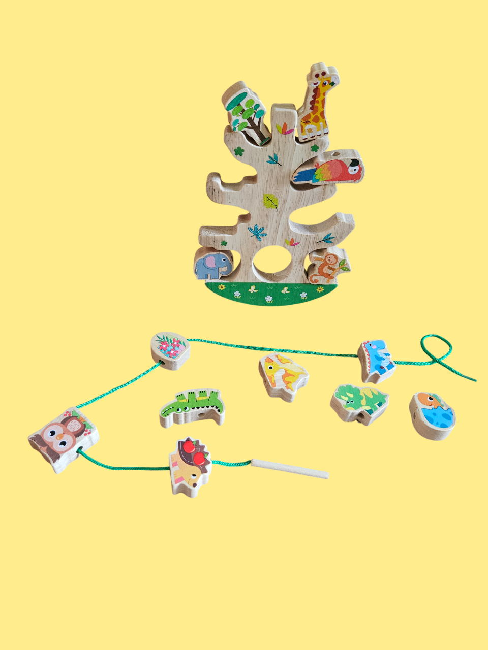 Juguete de equilibrio con forma de árbol de animales en caja.