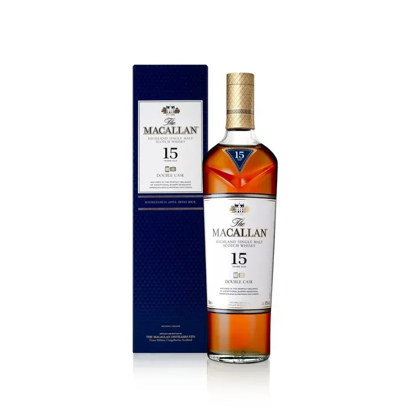 Macallan 15 Year Old whisky bottle and box; amber liquid, white label, blue box.