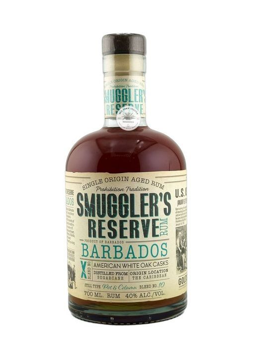 Bottle of Smuggler's Reserve Barbados rum, brown liquid inside, tan and green label.