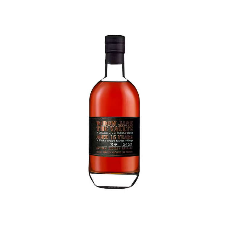 Bottle of brown liquor, with a black label, titled 