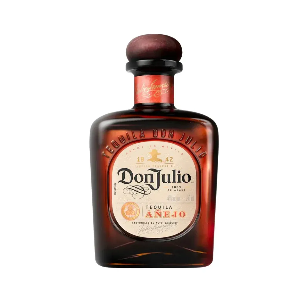 Don Julio Añejo tequila bottle. Brown glass with white label and red accents.