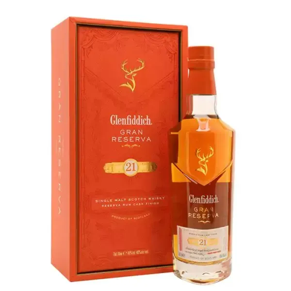 Glenfiddich Gran Reserva 21 Year Old whisky bottle and orange box with a deer logo.