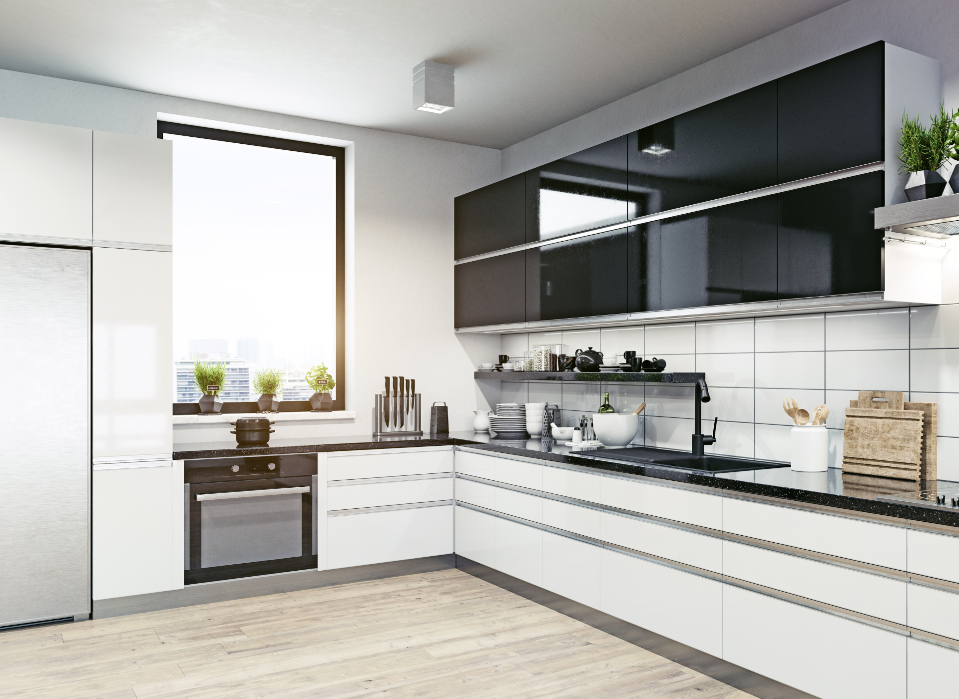 A kitchen with white cabinets , a stove , a sink , and a microwave.