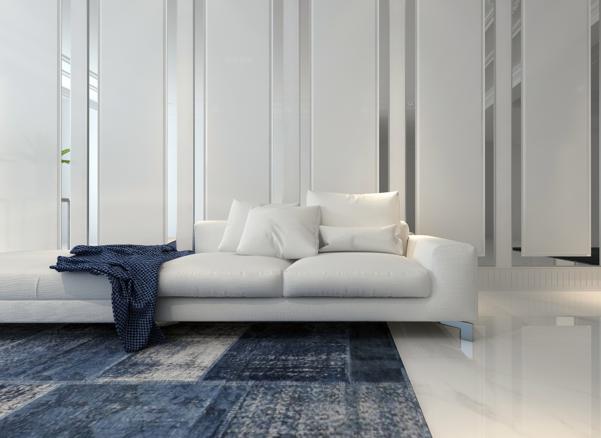 An empty living room with a large window and carpet.