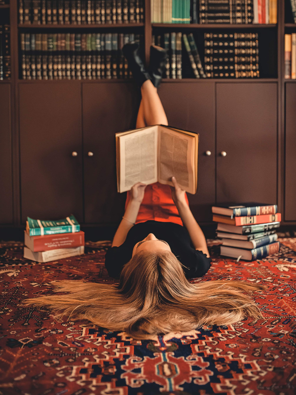A living room filled with furniture and a fireplace.