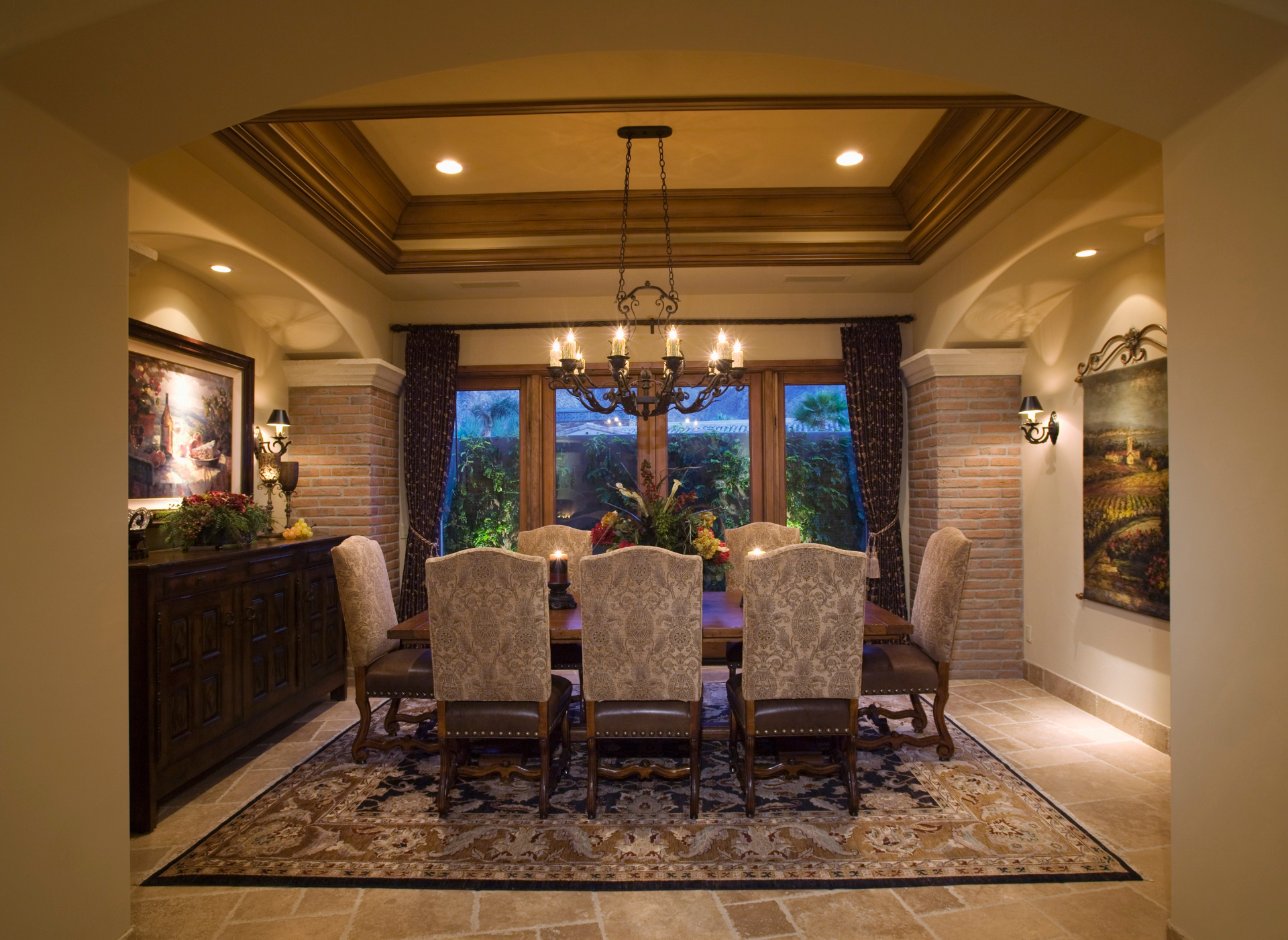 An empty room with a carpeted floor and beige walls