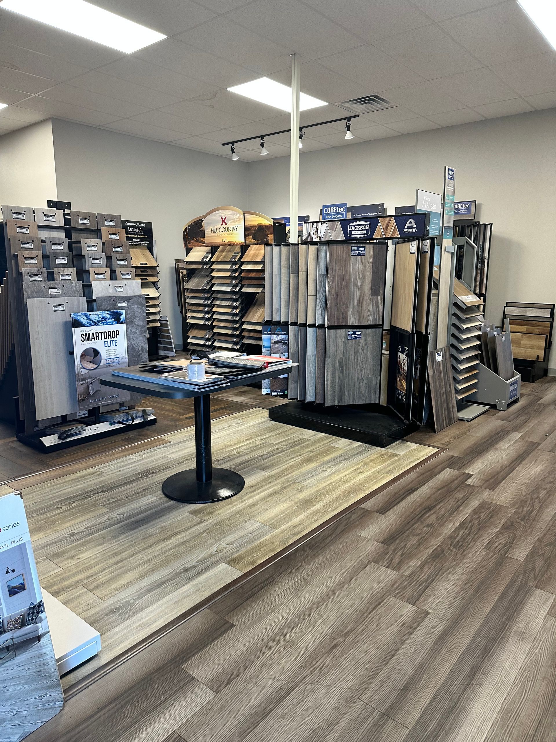 A showroom filled with lots of different types of flooring and carpets Menke Inc. Abilene, TX