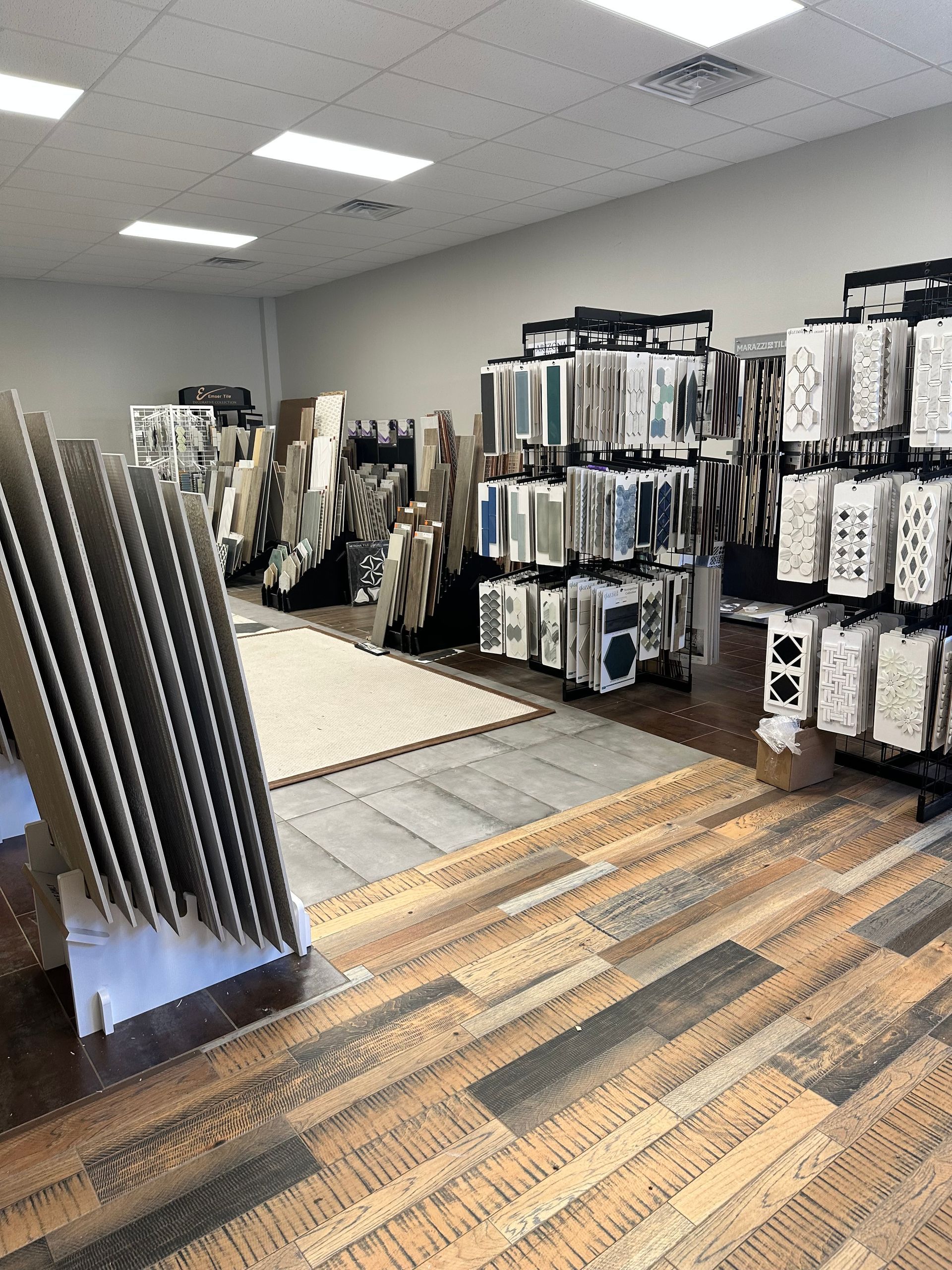 A large room filled with lots of tiles and carpets Menke Inc. Abilene, TX