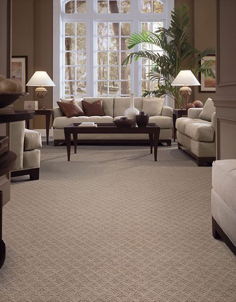 A living room filled with furniture and a couch