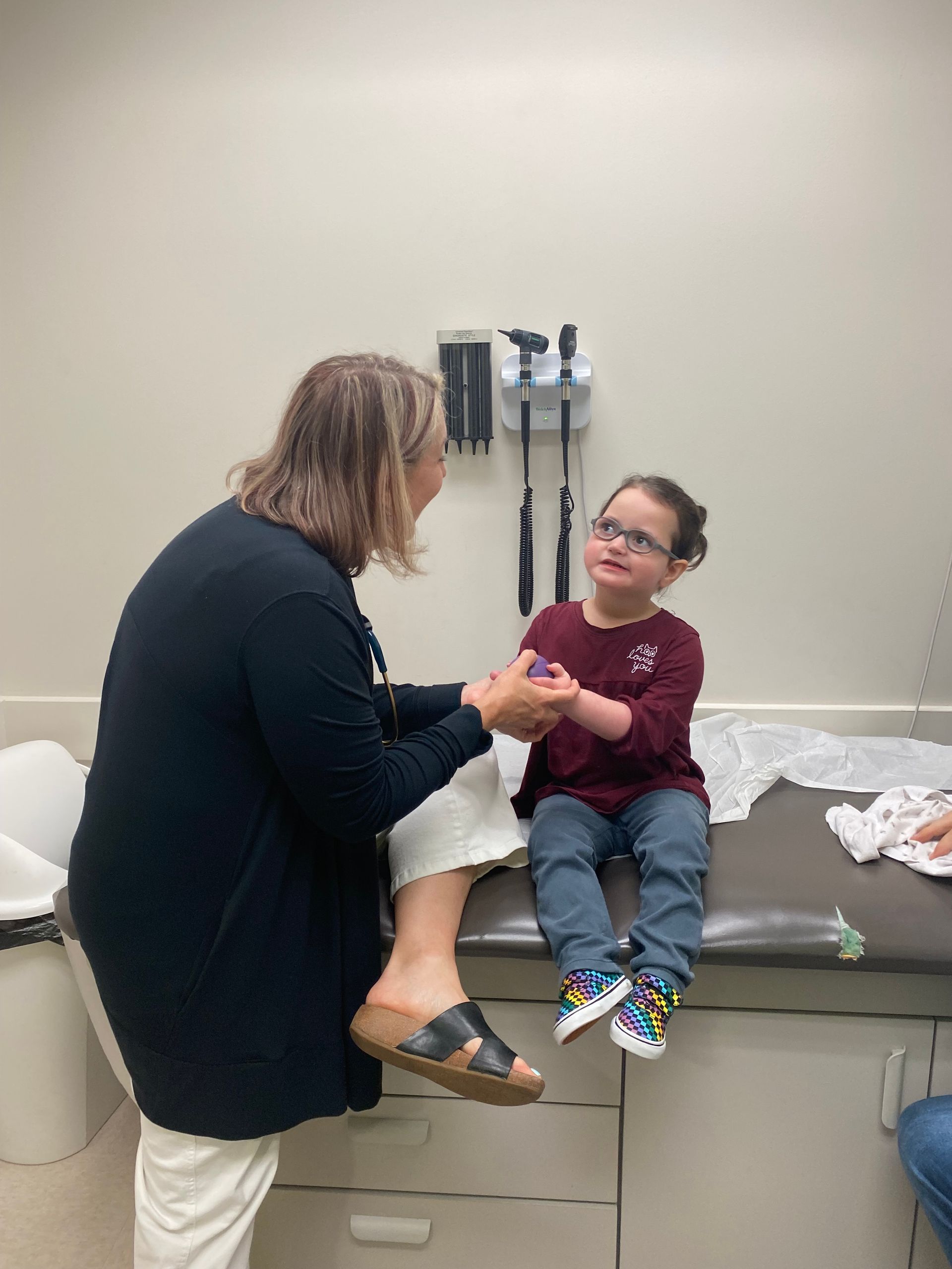 Doctor and child in the exam room