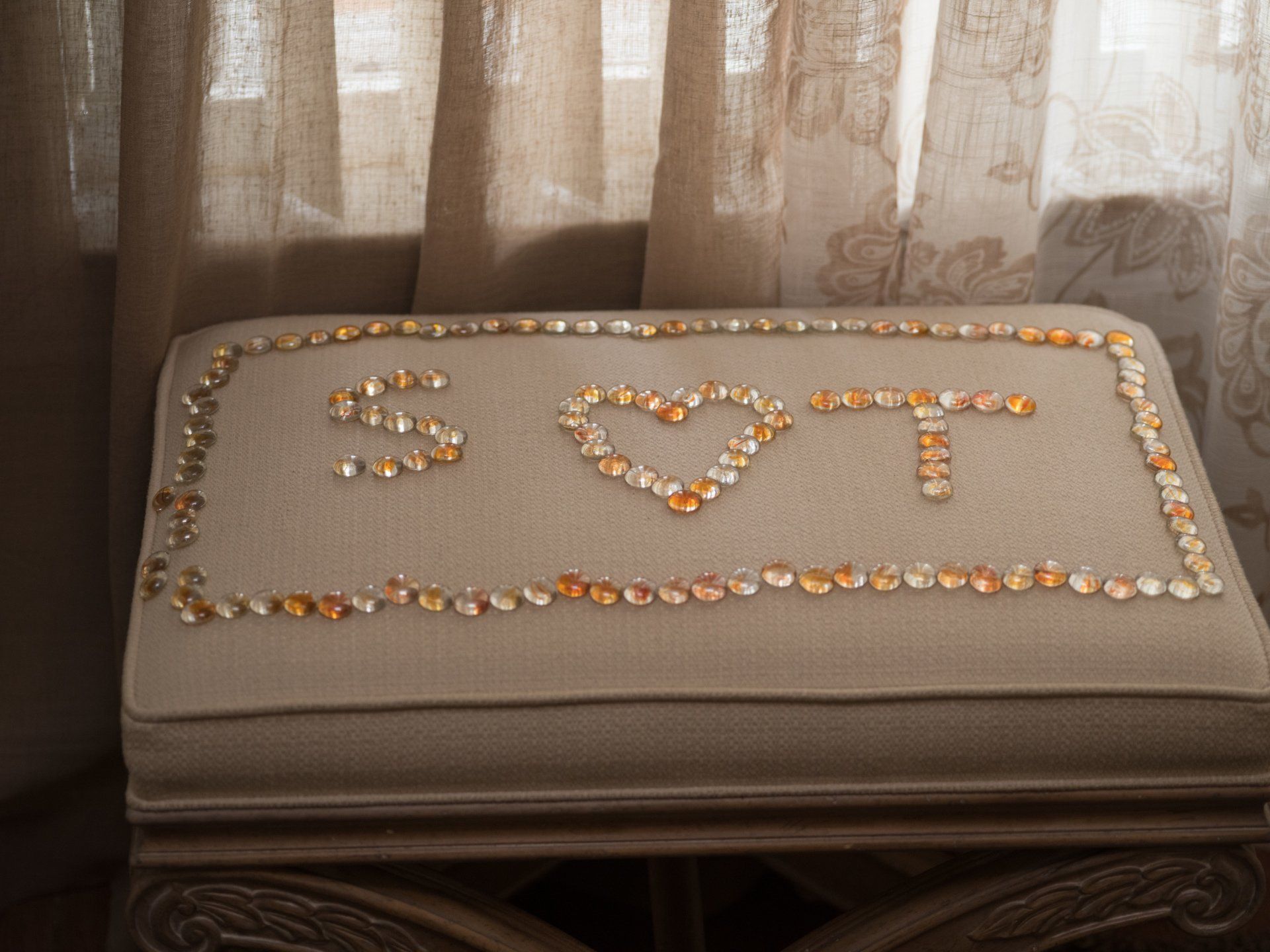 A cushion with the letters svt on it