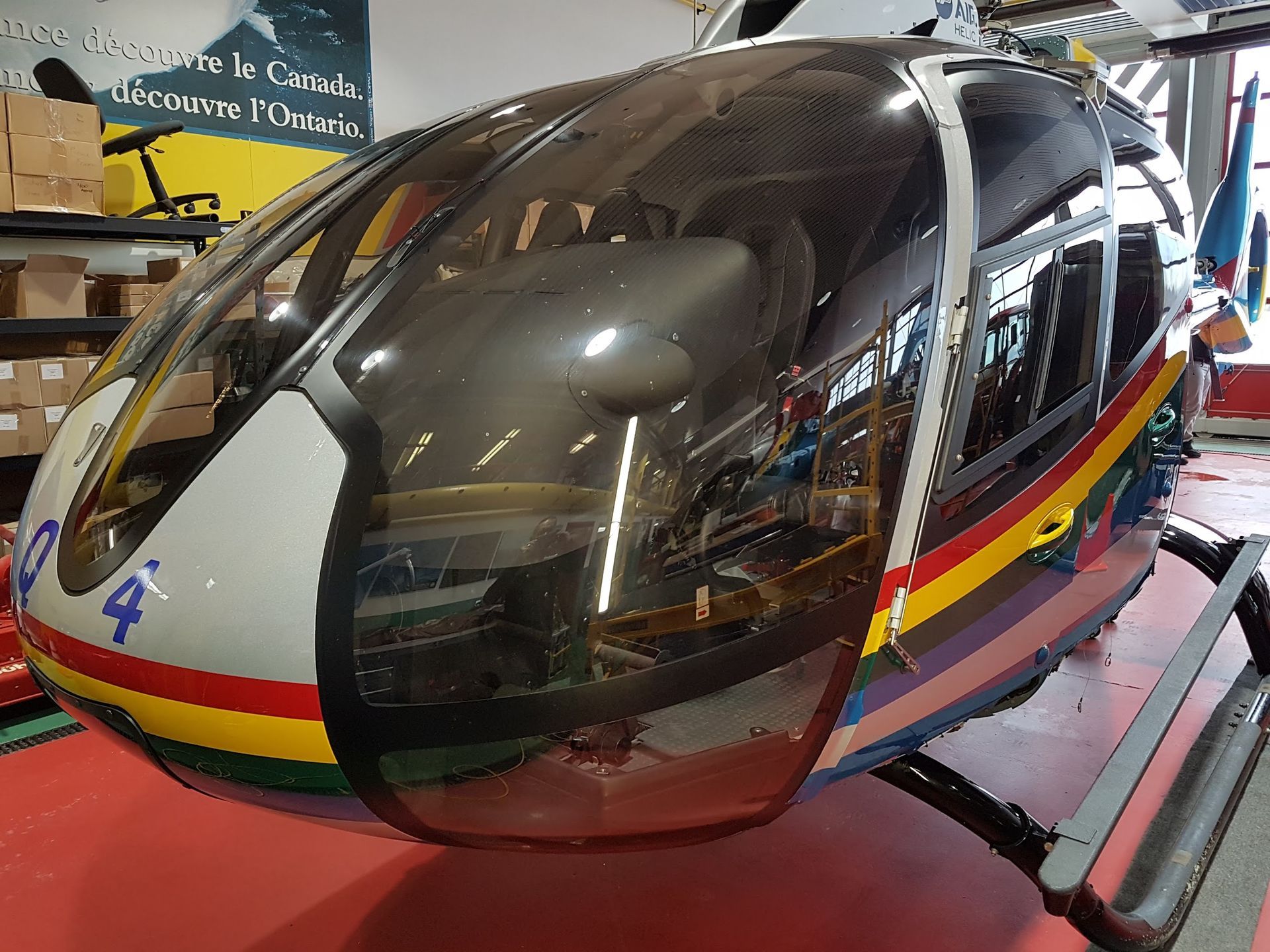 Helicopter cockpit with rainbow stripes, blue