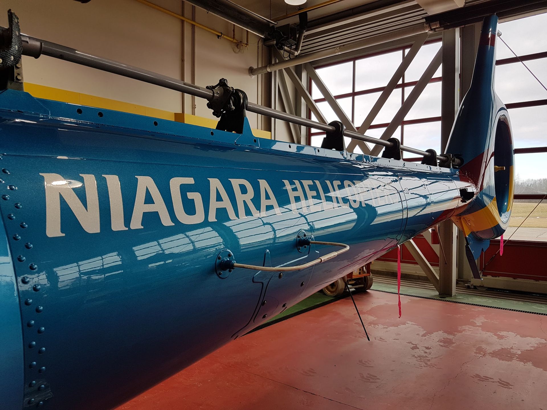 Blue helicopter tail labeled