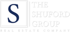 Logo for The Shuford Group Real Estate Company with a large blue “S” and white text