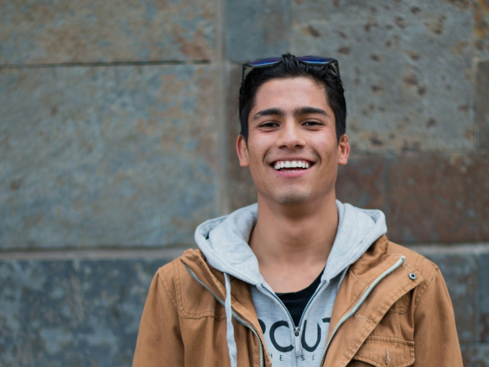 Photo of Hispanic teen male smiling