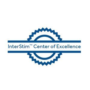 the interstim center of excellence logo is a blue seal with a sun on it .