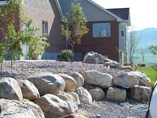 A House with Stone Designs — Soil Supplier Near in Logan, Utah