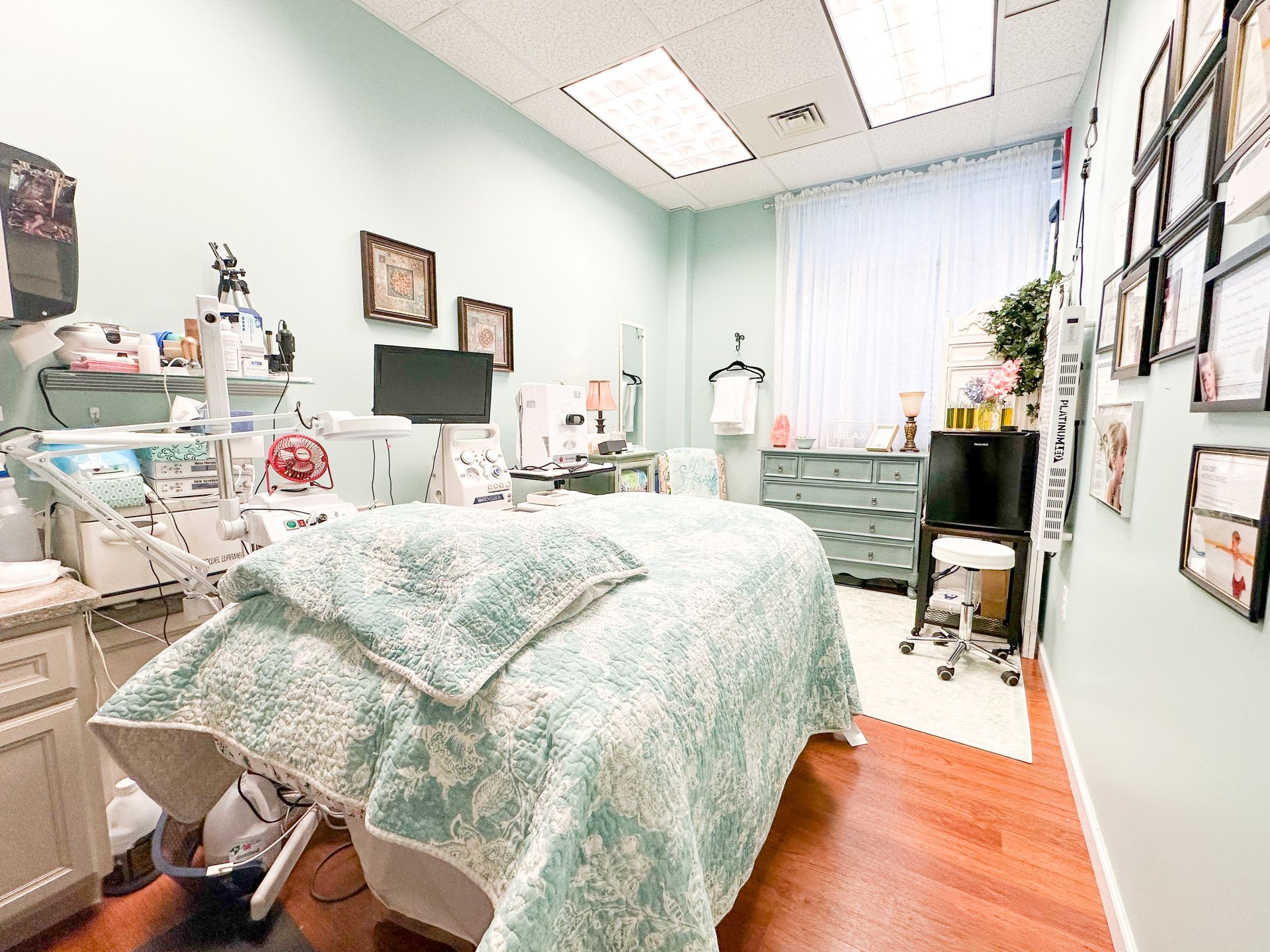 There is a bed in the middle of the room.