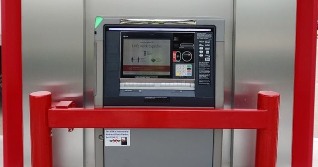 A computer monitor with a red frame around it.