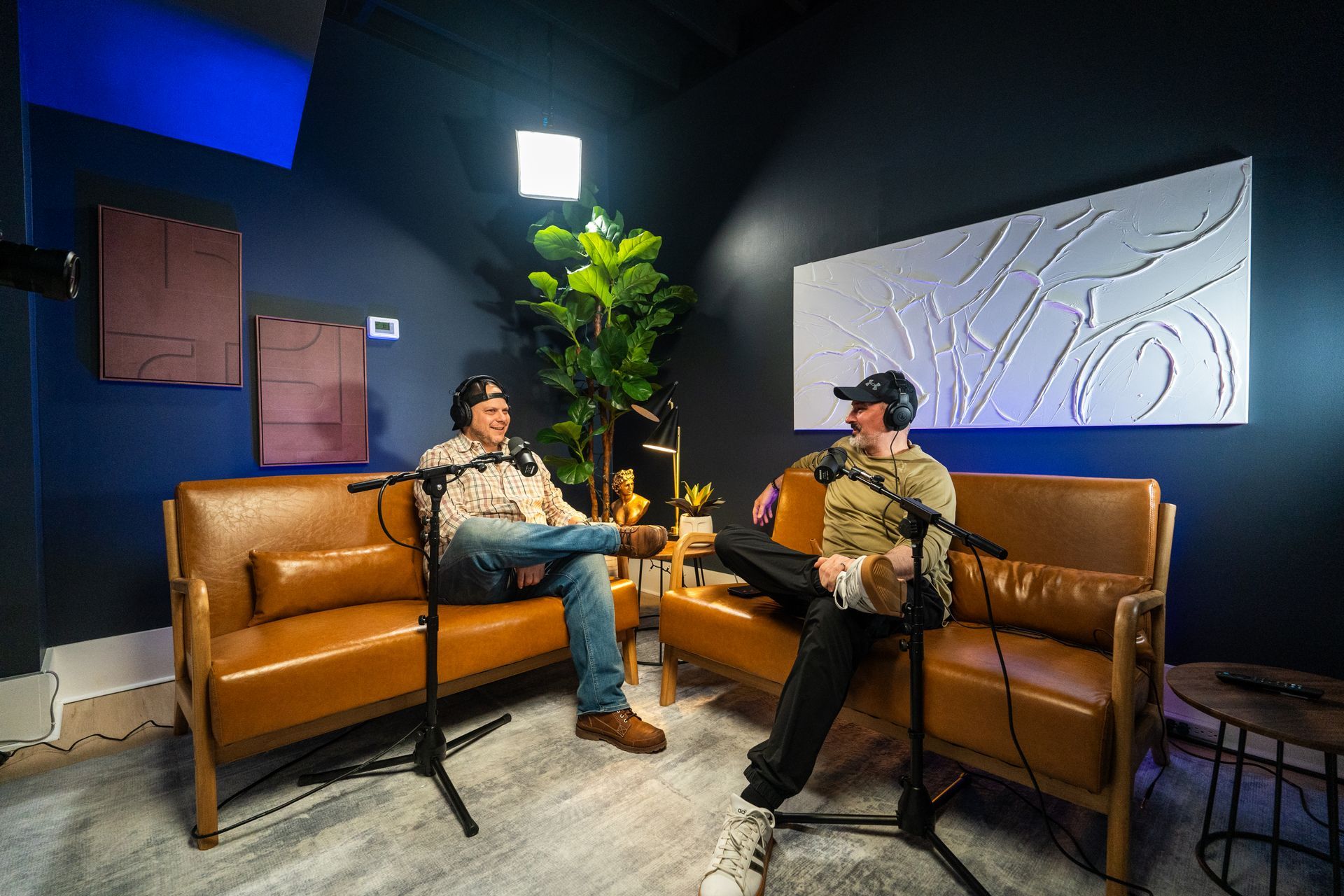 Two men recording a video podcast at NJ Content Studio