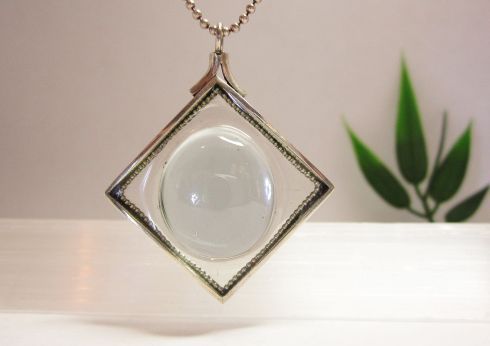 Zilveren hanger met zwevend glas van Karen Klein edelsmid