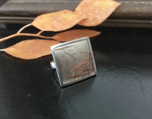 Zilveren vierkante ring met koper van Karen Klein edelsmid