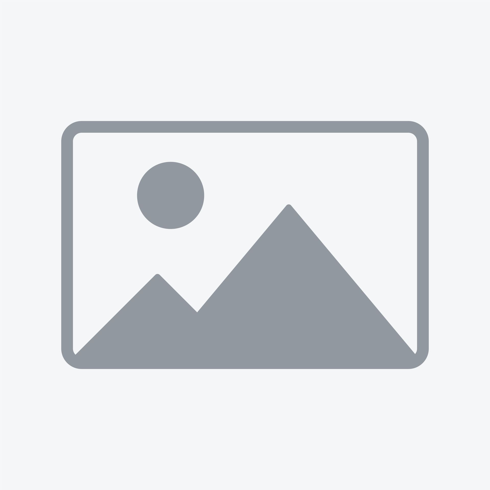 Hand inserting a white outlet cover into an electrical outlet. Beige wall.