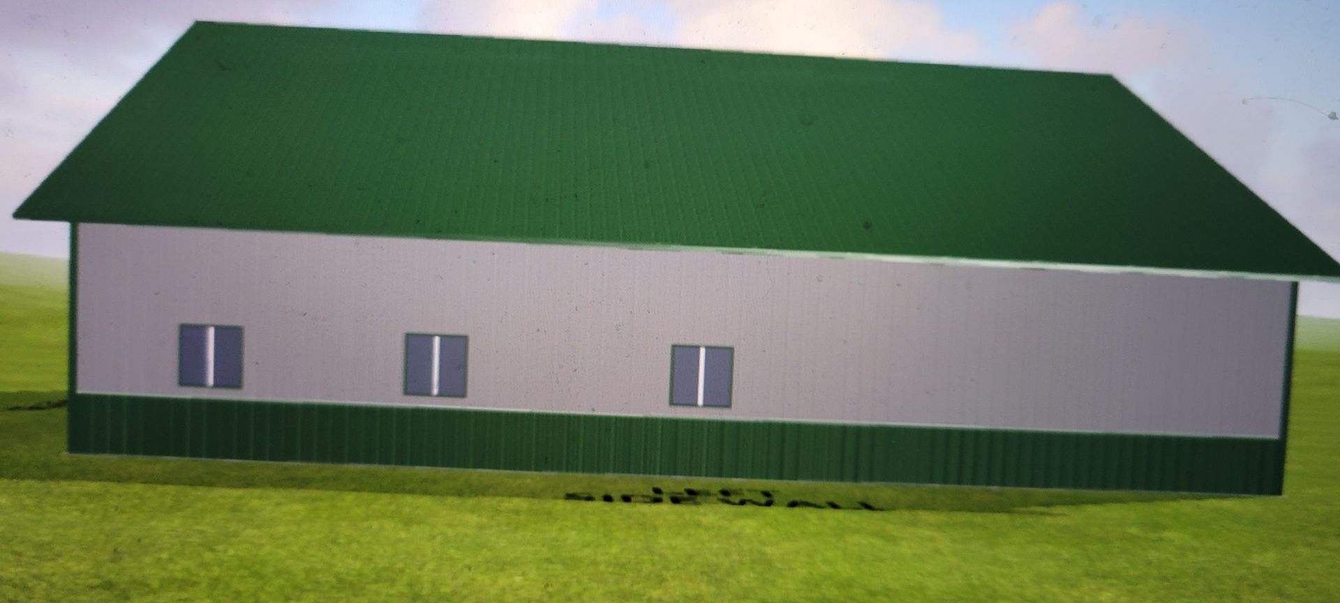 A green-roofed white building with three windows on a grassy field.